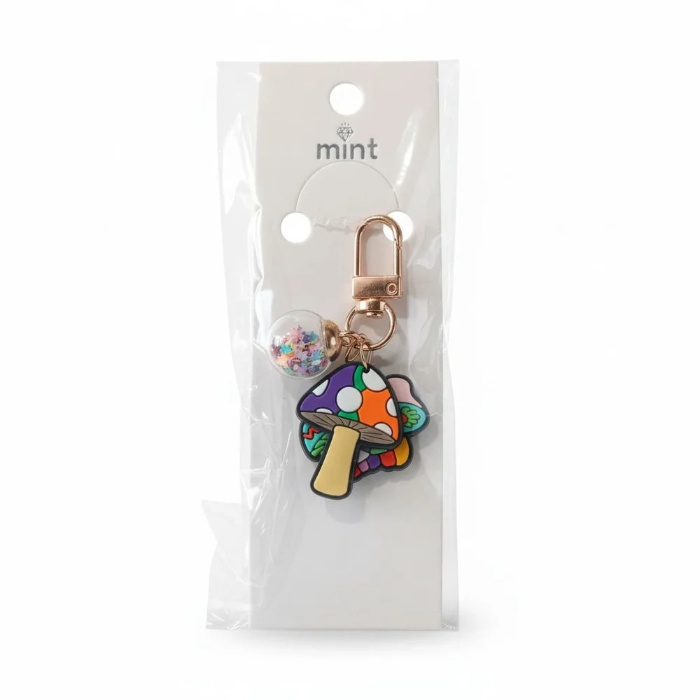 Whimsical Mushroom Keychain with Glitter Star Sphere